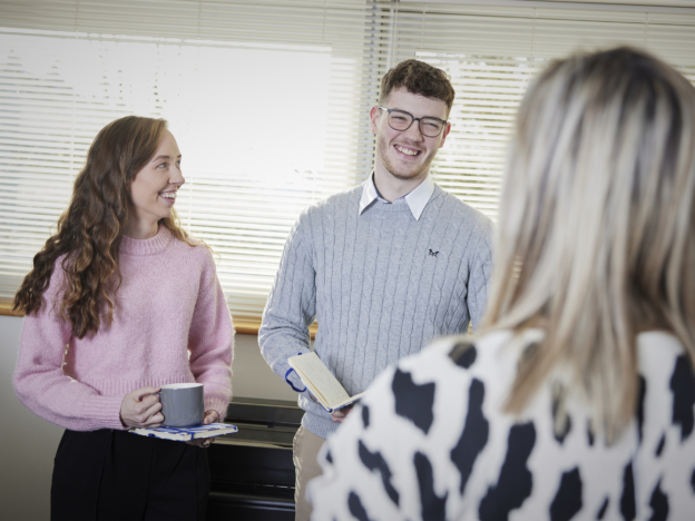 Team discussion in breakout area